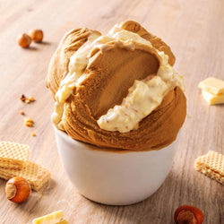 Arabeschi Cioccobianco Nocciola Rock PreGel – Crema variegata per gelateria e pasticceria, ideale per decorazioni, farciture e topping gourmet.