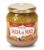 Vaso di vetro Demetra di salsa di noci da 580 ml accanto a un piatto di ravioli conditi