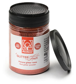 Barattolo di polvere glitter decorativa rossa Modecor da 40 g con brillantini rossi su una torta